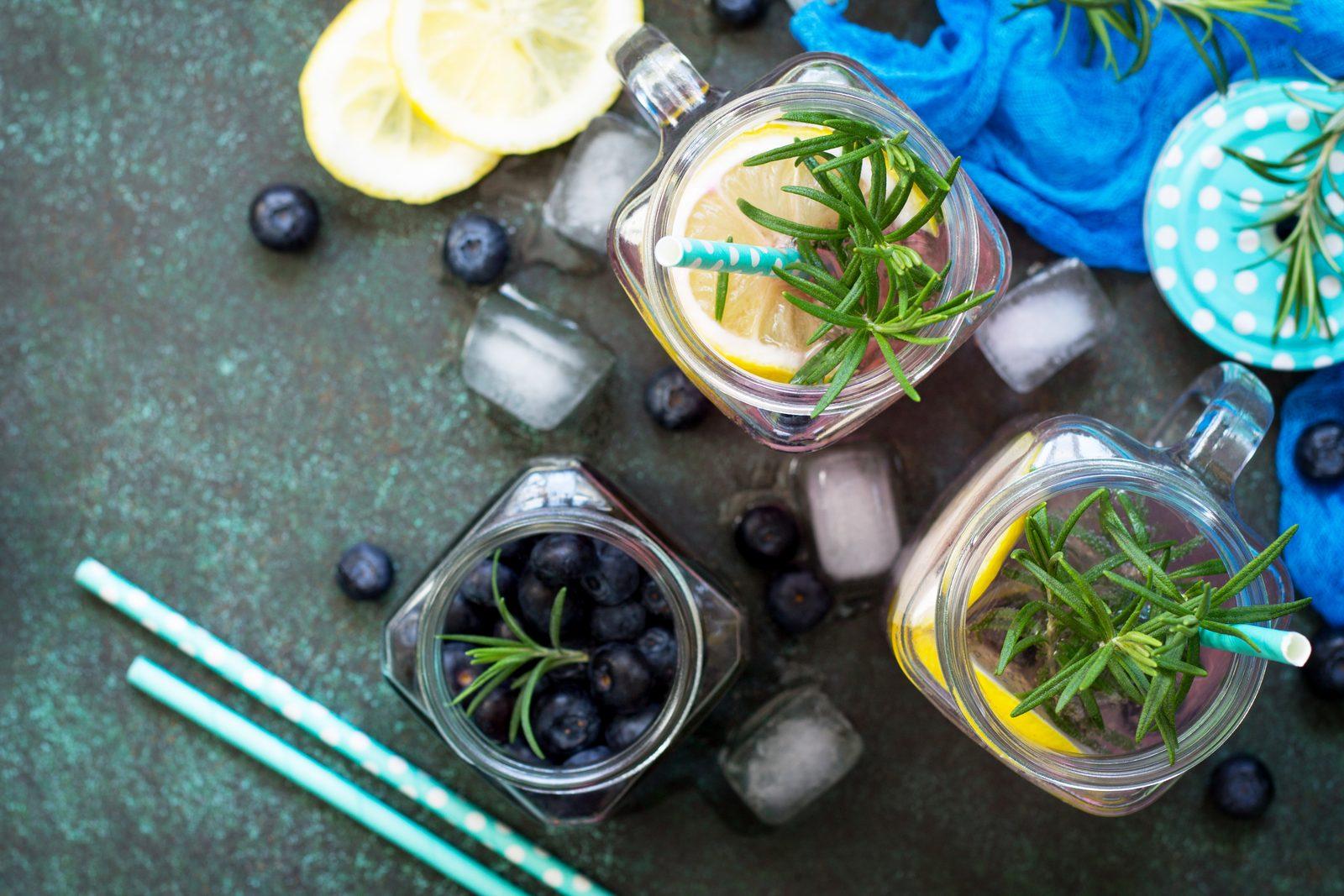 Refreshing blueberry lemonade drink with rosemary